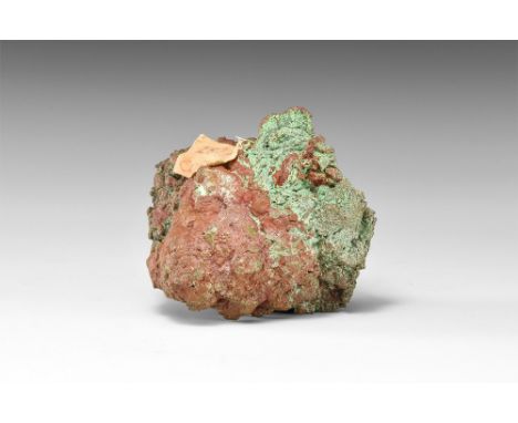 A specimen of crystallised native copper from Cornwall, UK, several areas showing fine crystal faces, with accessory malachit