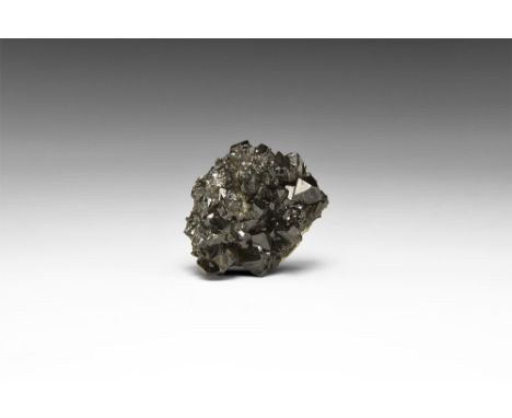 A cluster of unusually bright and lustrous well-formed cassiterite crystals, probably from Cornwall; in white card tray. See 