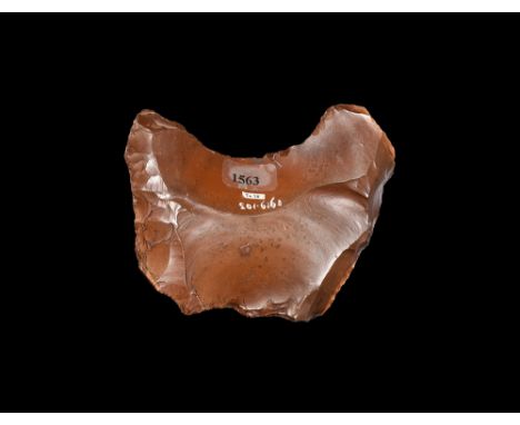 Palaeolithic, 600000-40000 BP.A fragment of a dark brown mottled flint tool, with finely knapped edges; inked 96.38 collectio