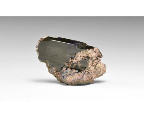 An exceptionally large and well-formed azurite crystal in matrix from the famous Tsumeb locality; in old white card tray. See