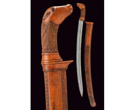 A rare parang dating: 19th Century provenance: Indonesia Strong, straight, tipped, single-and false-edged blade, with wide fu