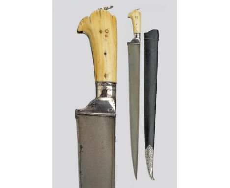 A long khyber knife dating: 19th Century provenance: India Big, straight, single-edged blade of fine, wootz damask, with "T"-