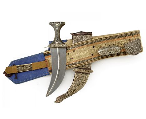 A jambiya (dagger) dating: circa 1900 provenance: Yemen Wide, double-edged blade with raiser at the center, engraved, depicti