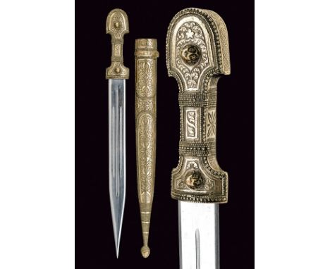 A silver mounted kindjal dating: early 20th Century provenance: Caucasia Straight, double-edged blade with triple fuller (lat