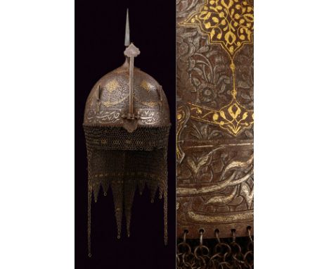 A silver-inlaid khula-khud dating: circa 1800 provenance: Indopersia Hemispherical, iron skull, surmounted by a squared cusp 