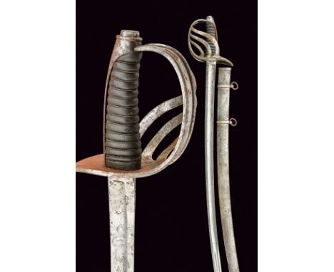 A cavalry sabre dating: mid-19th Century provenance: Piedmont Curved, single-and false-edged blade with wide fuller, engraved