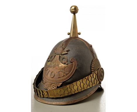 A rare Civil Guard helmet dating: second quarter of the 19th Century provenance: Papal States Rigid, black leather skull, gil