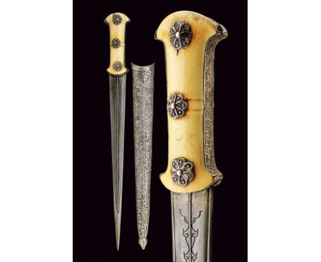 A nice dagger dating: first quarter of the 19th Century provenance: Ottoman Empire Straight, double-edged blade of fine damas