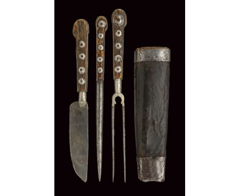 A silver mounted trousse dating: first quarter of the 19th Century provenance: Germany The blade of the knife decorated with 