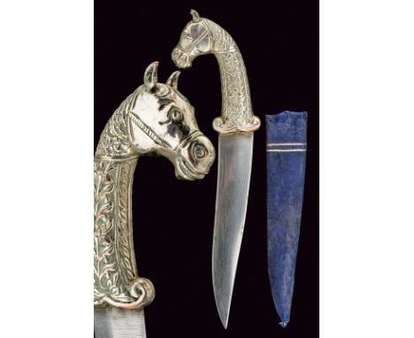 A kandshar dating: late 19th Century provenance: Persia Almost-straight, double-edge blade of lenticular section. Silver-plat