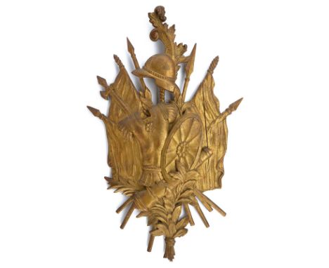 A wooden gilded trophy dating: third quarter of the 18th Century provenance: France A fine trophy depicting an old-fashioned 