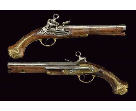 A pair of flintlock pistols dating: 18th Century provenance: Spain Smooth, two-stage, 17 mm cal. barrels, octagonal at the fi