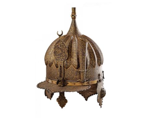 A turban type helmet dating: first quarter of the 20th Century provenance: Turkey Iron skull, of conical shape at the top, wi