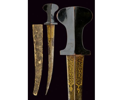 A dagger dating: circa 1800 provenance: Arabia Wide, curved, probably damask, double-edged blade with thin raiser at the cent