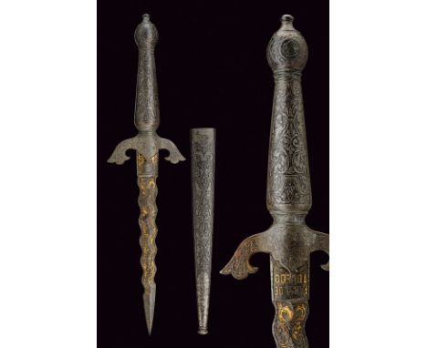 A fine dagger dating: 19th Century provenance: Spain Straight,undulated, double-edged blade, finely engraved and gilt with fl