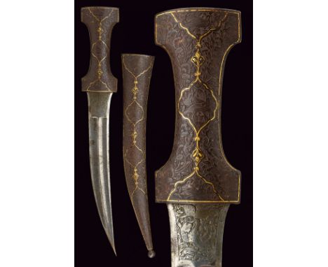 Fine and large Jambiya from the Qajar period, dating: 19th Century provenance: Persia Curved, double-edged blade, depicting a