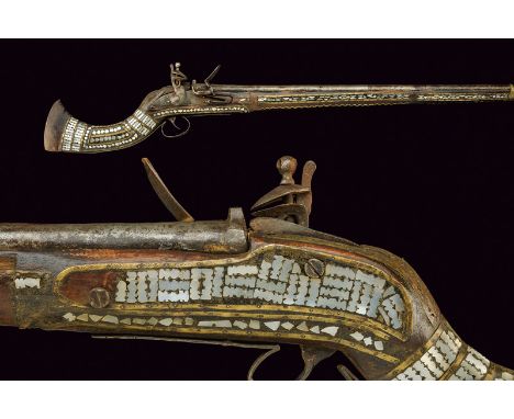 A jezail dating: 19th Century provenance: Afghanistan Round, smooth, iron, 14 mm cal. barrel with moulded muzzle at the nozzl