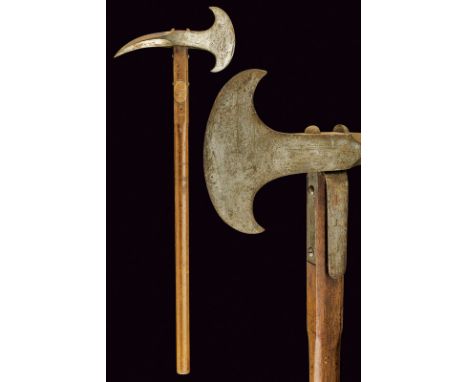 A fireman axe dating: second quarter of the 19th Century provenance: Southern Italy Iron axe with half-moon edge, handle bent