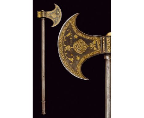 A fine tabar (axe) with stylet dating: last quarter of the 19th Century provenance: India Iron head with round-edged axe, dec