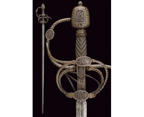 A beautiful rapier in late 16th Century style dating: 19th Century provenance: Germany Wide, straight, double-edged blade wit