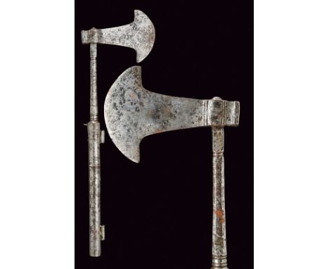 A rare tabar combined with gun dating: 19th Century provenance: Indopersia Small, iron axe with strongly curved edge and long