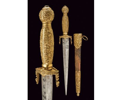 A gillt-mounted dagger dating: 19th Century provenance: Turkey Straight, double-edged blade of lozenge section. Gilt, metalli