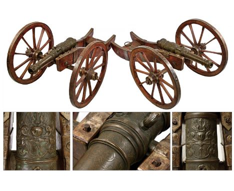 An important pair of cannons on a mobile support dating: 18th Century provenance: Europe Bronze barrels, shaped as a truncate