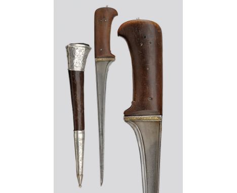 A karud dating: 19th Century provenance: Indopersia Straight, single-edged blade of fine, wootz damask, with raisers and "t"-