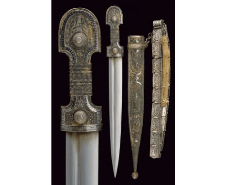 A kindjal with silver belt dating: late 19th Century provenance: Caucasia Strong, double-edged blade of lenticular section an