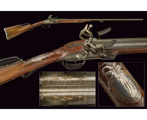 A fine double barrelled flintlock gun from the property of the noble family Ruffo from Calabria dating: circa 1800 provenance