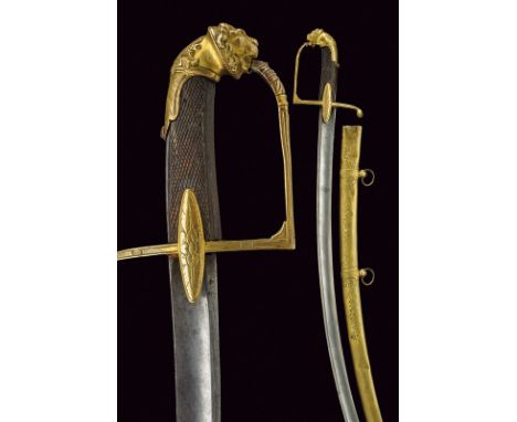 A first Empire officers sabre dating: early 19th Century provenance: France Curved, single-and false-edged blade; brass hilt,