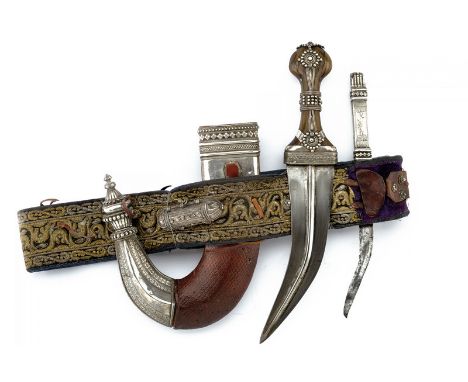 A silver mounted jambiya (dagger) dating: first quarter of the 20th Century provenance: Yemen Curved, double-edged blade with