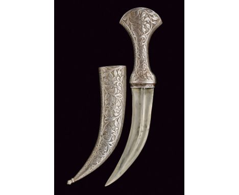 A kandshar dating: late 19th Century provenance: Arabia Curved, double-edged blade with cannelure at the center, probably mad