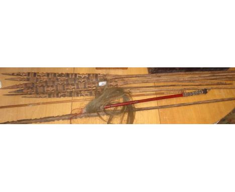 African Fly whisk and eight all wood souvenir fishing spears