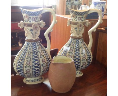 Pair of Fischer J Budapest ewer vases decorated with floral motifs and raised ceramic flowers (A/F) together with a Ch Brannu