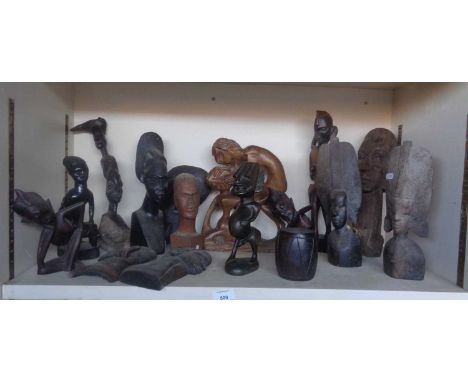 Collection of African carved hardwood figures including fertility dolls etc