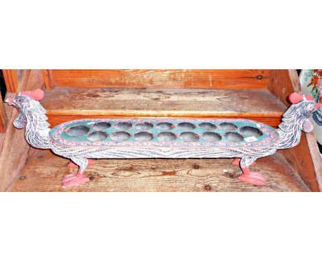 Vintage mancala game in carved and painted wood stand, with rooster ends and feet