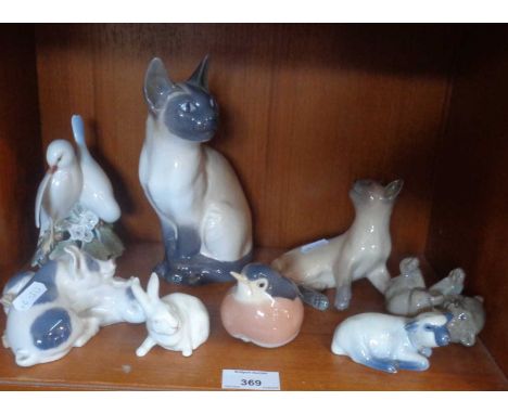 Eight various Royal Copenhagen animal figures including Siamese cats etc