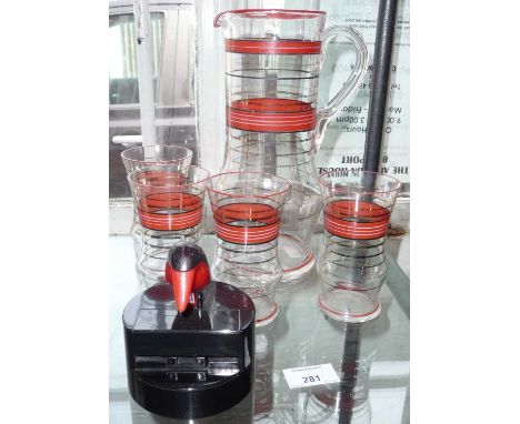 1950's glass lemonade set and a plastic penguin cigarette dispenser
