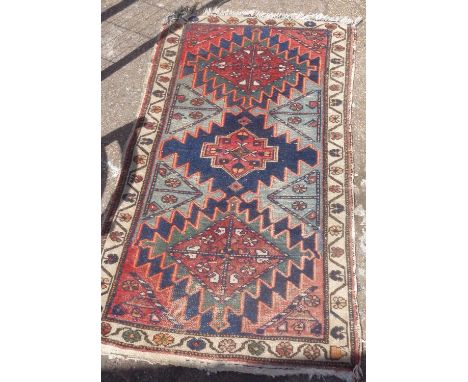Persian rug, 130cm long x 72cm wide