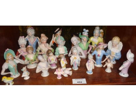 Large collection of china pin cushion dolls