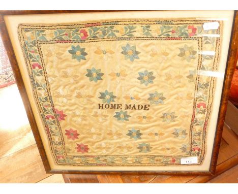 Sampler of stylised flowers and having a central motif saying "Home Made", 16" x 16" including frame