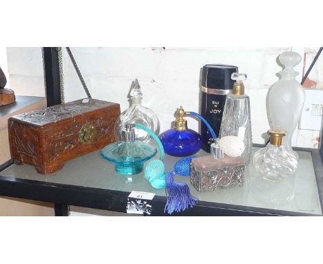 Assorted scent bottles (8) and atomisers and an Oriental carved wood casket