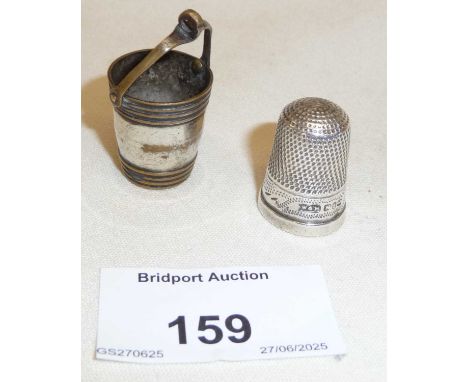 Novelty thimble holder for Chatelaine in the form of a miniature water bucket containing a silver thimble hallmarked for Birm