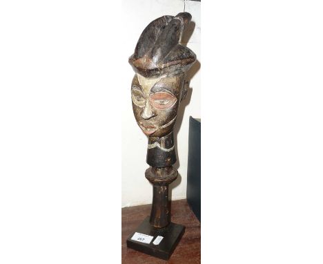 Tribal Art - Ibo carved and painted wood hand-held figurative wand 43cm on stand