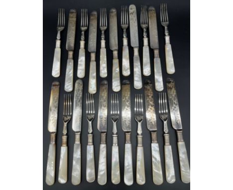 Twenty Piece silver plate and mother of pearl handle fork and knives set. 