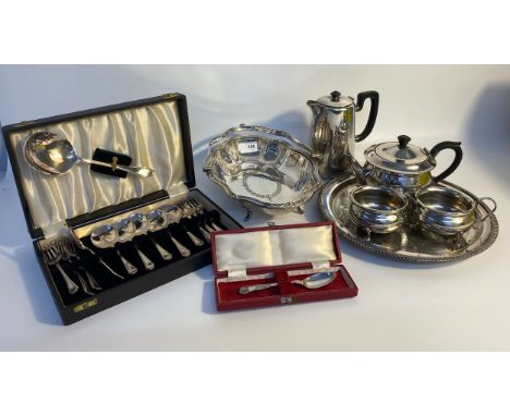 A selection of silver plated ware; boxed cutlery, swing handled basket and 5 piece silver plated tea/coffee service 