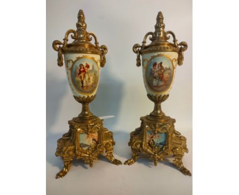 A Pair of Reproductions of Two Victorian Garniture urn vases, Brass body and enamel printed panels. [32cm high] 