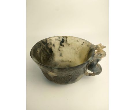 A Chinese jade pale green/ black cup with animal handle [15cm] 