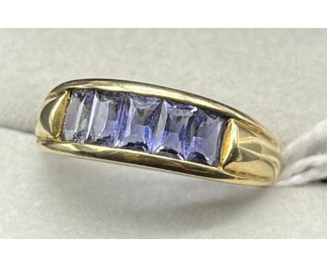 9ct yellow gold ring set with five Emerald cut Amethyst gem stones [Ring size R] [4.58Grams] 